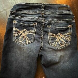 Skinny leg blue jeans mid low rise size 0 Wall Flower